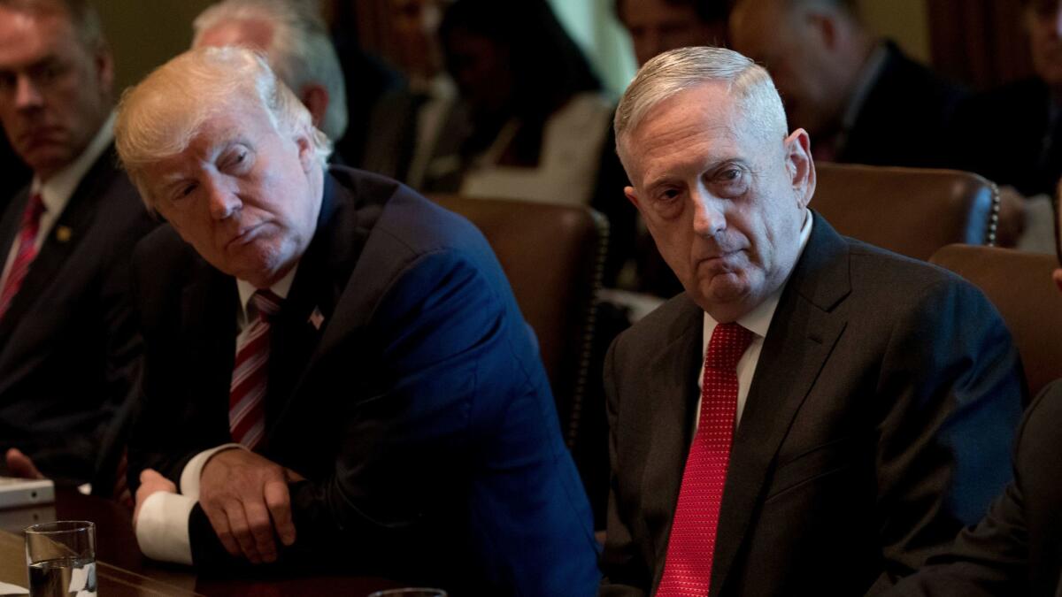 President Trump is expected to declare that the Iran nuclear deal is not in the U.S. national interest. That would contradict testimony that Defense Secretary James N. Mattis, right, recently gave to Congress.