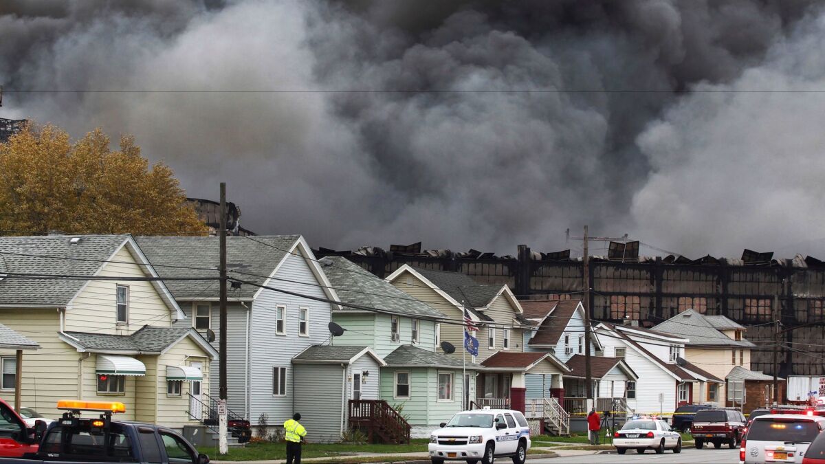 Smoke rises from a fire at a former Bethlehem Steel site in Lackawanna, N.Y.
