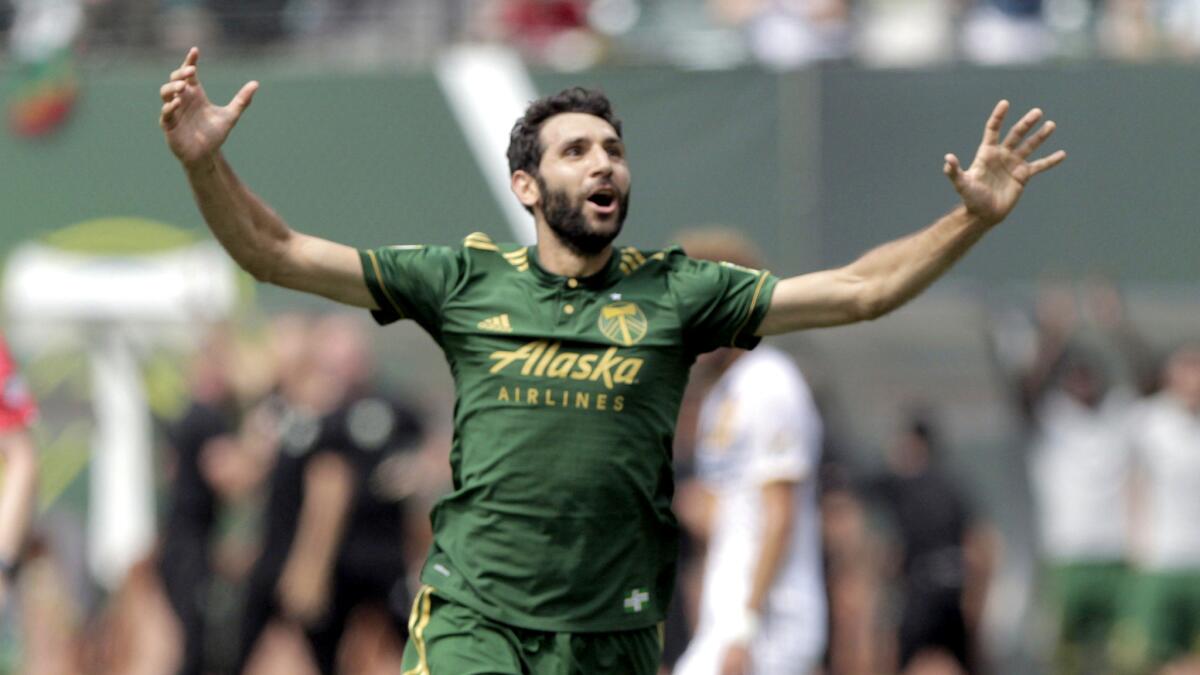 Diego Valeri celebrates after scoring the Timbers' second goal against the Galaxy on Sunday.