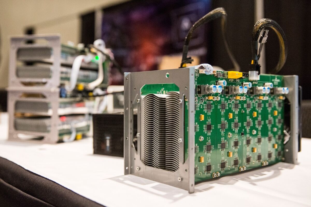 Bitcoin mining hardware is displayed at a bitcoin conference in New York City.