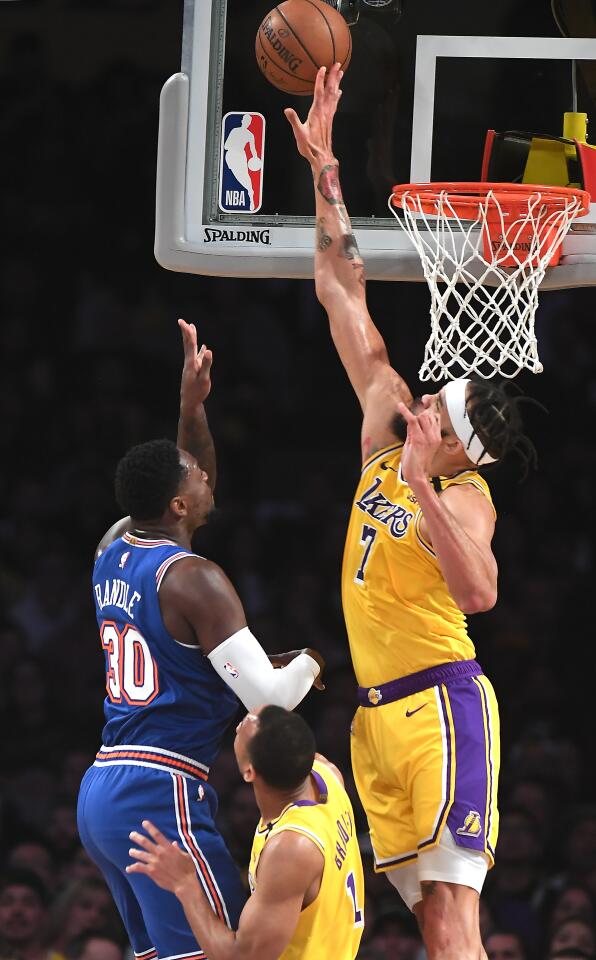 JaVale McGee blocks a shot from Knicks forward Julius Randle during the first quarter of a game Jan. 7 at Staples Center.