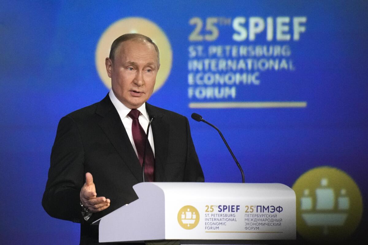 Russian President Vladimir Putin gestures as he addresses a plenary session of the St. Petersburg International Economic Forum in St. Petersburg, Russia, Friday, June 17, 2022. Putin began his address to the St. Petersburg International Economic Forum with a lengthy denunciation of countries that he contends want to weaken Russia, including the United States who, he said, "declared victory in the Cold war and later came to think of themselves as God's own messengers on planet Earth." (AP Photo/Dmitri Lovetsky)