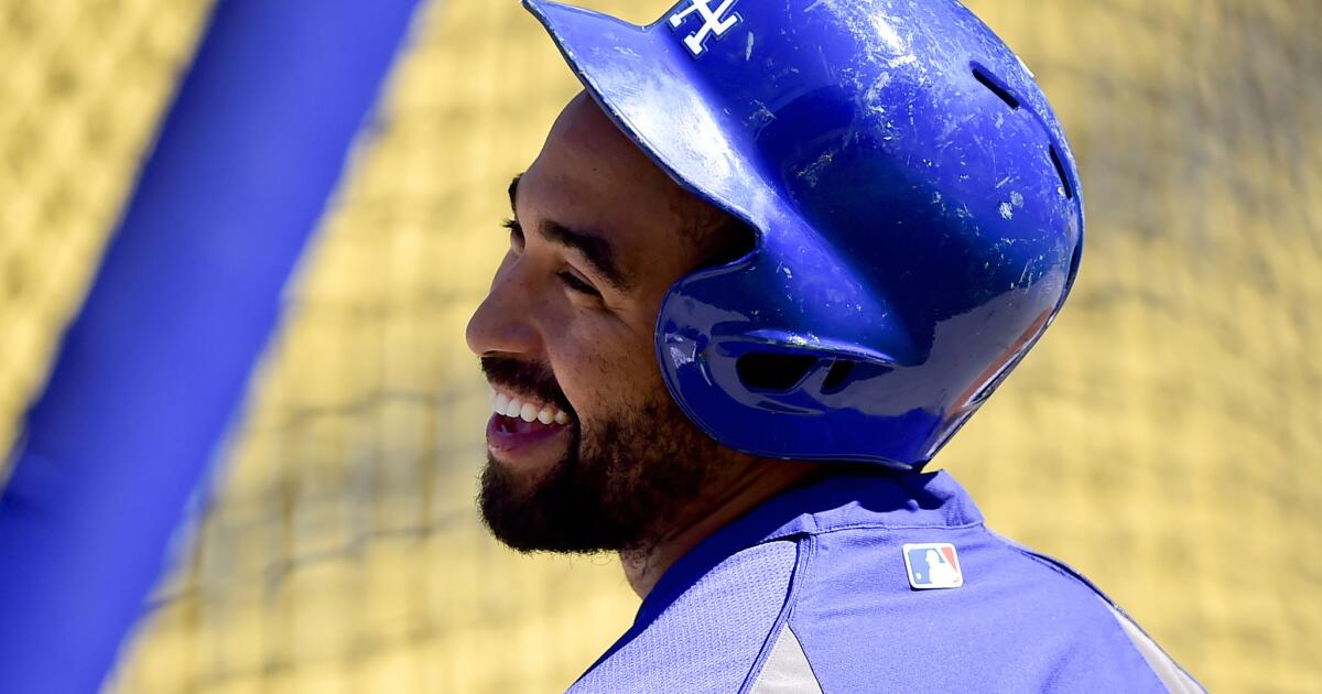 San Diego Padres outfielder Matt Kemp laughs during a news