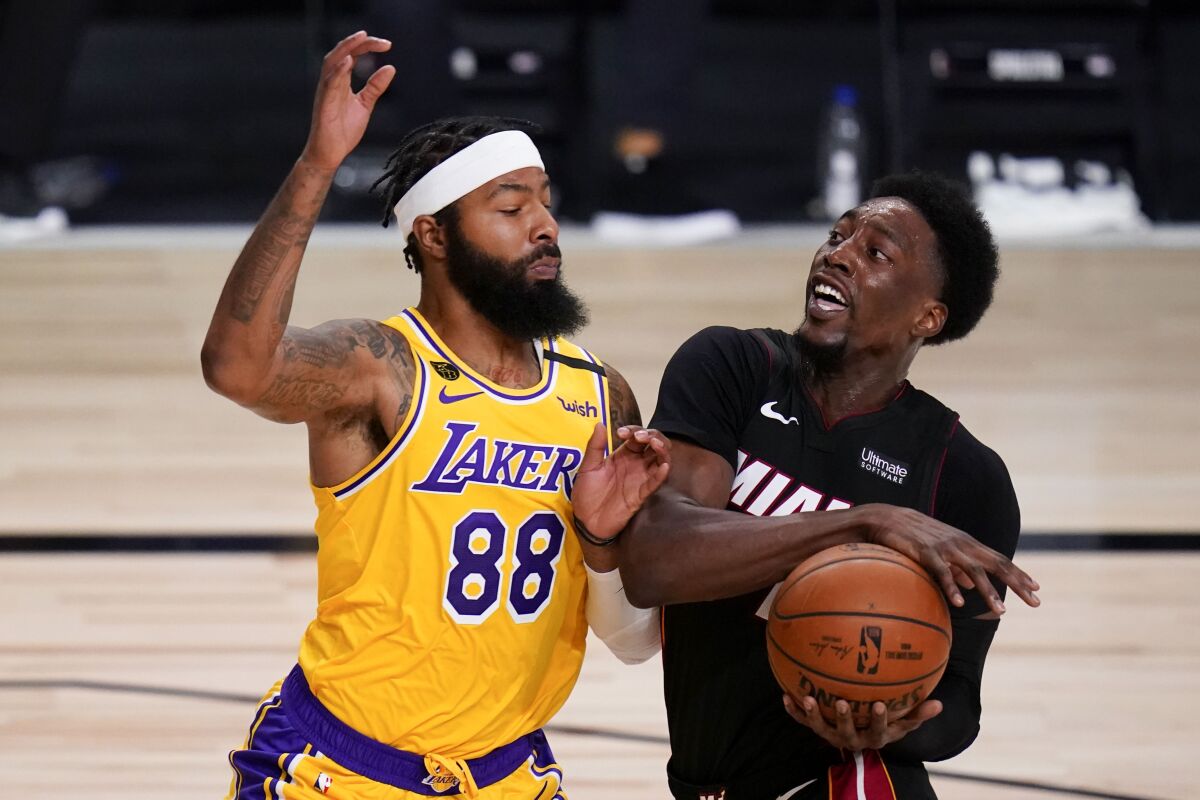 Lakers forward Markieff Morris pressures Heat center Bam Adebayo during the first half of Game 4 on Oct. 6, 2020.