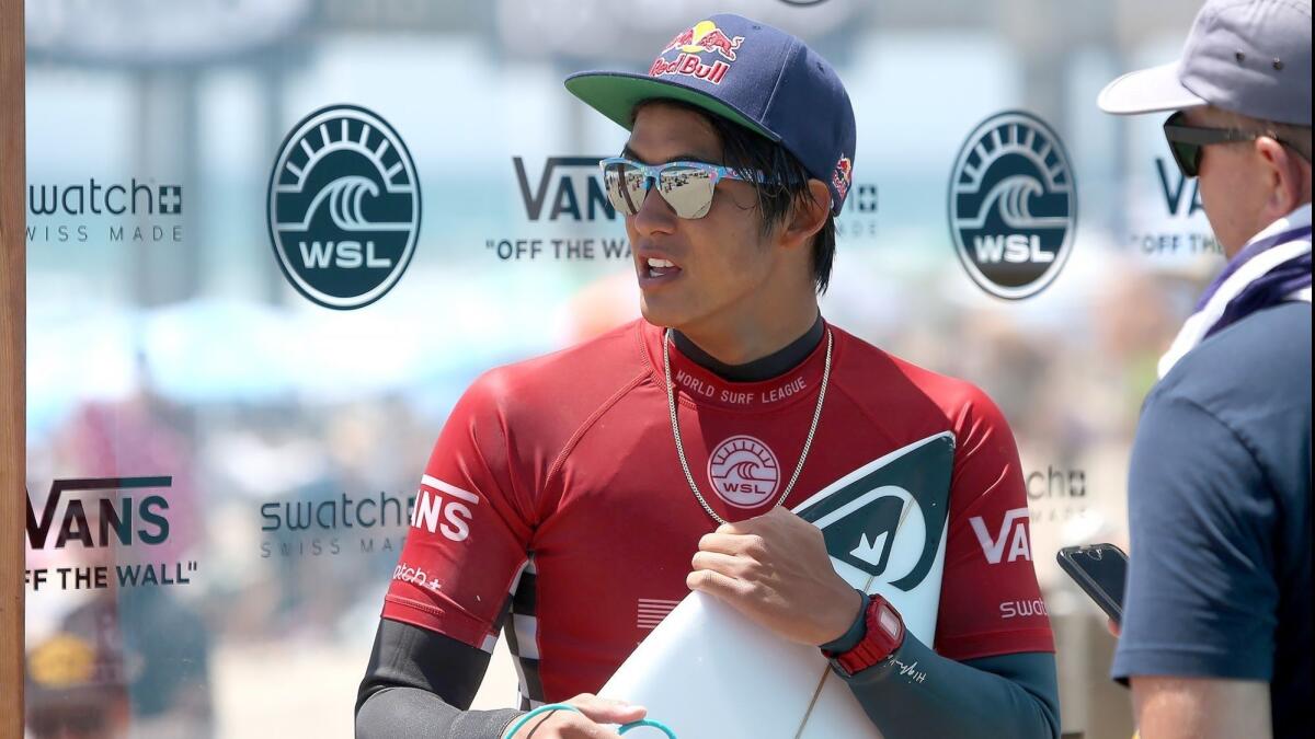 Huntington Beach's Kanoa Igarashi surveys the lineup after winning his heat in round two at the U.S Open of Surfing on Wednesday.