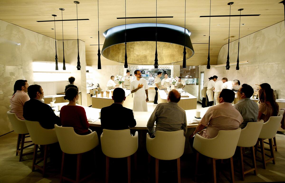 Diners at Somni’s 10-seat chef’s counter at SLS Beverly Hills.