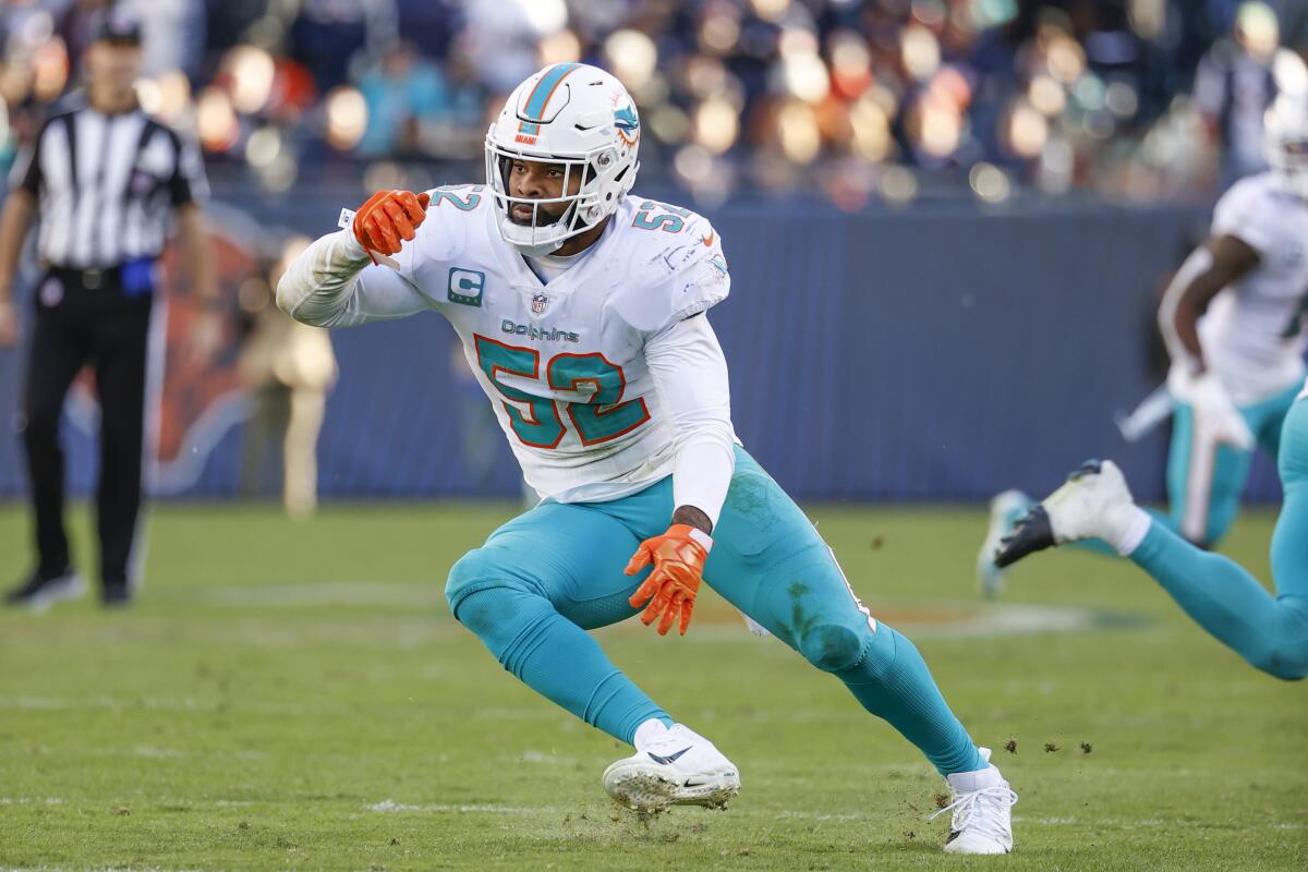 Miami Dolphins linebacker Elandon Roberts runs on the field during the second half against the Chicago Bears.