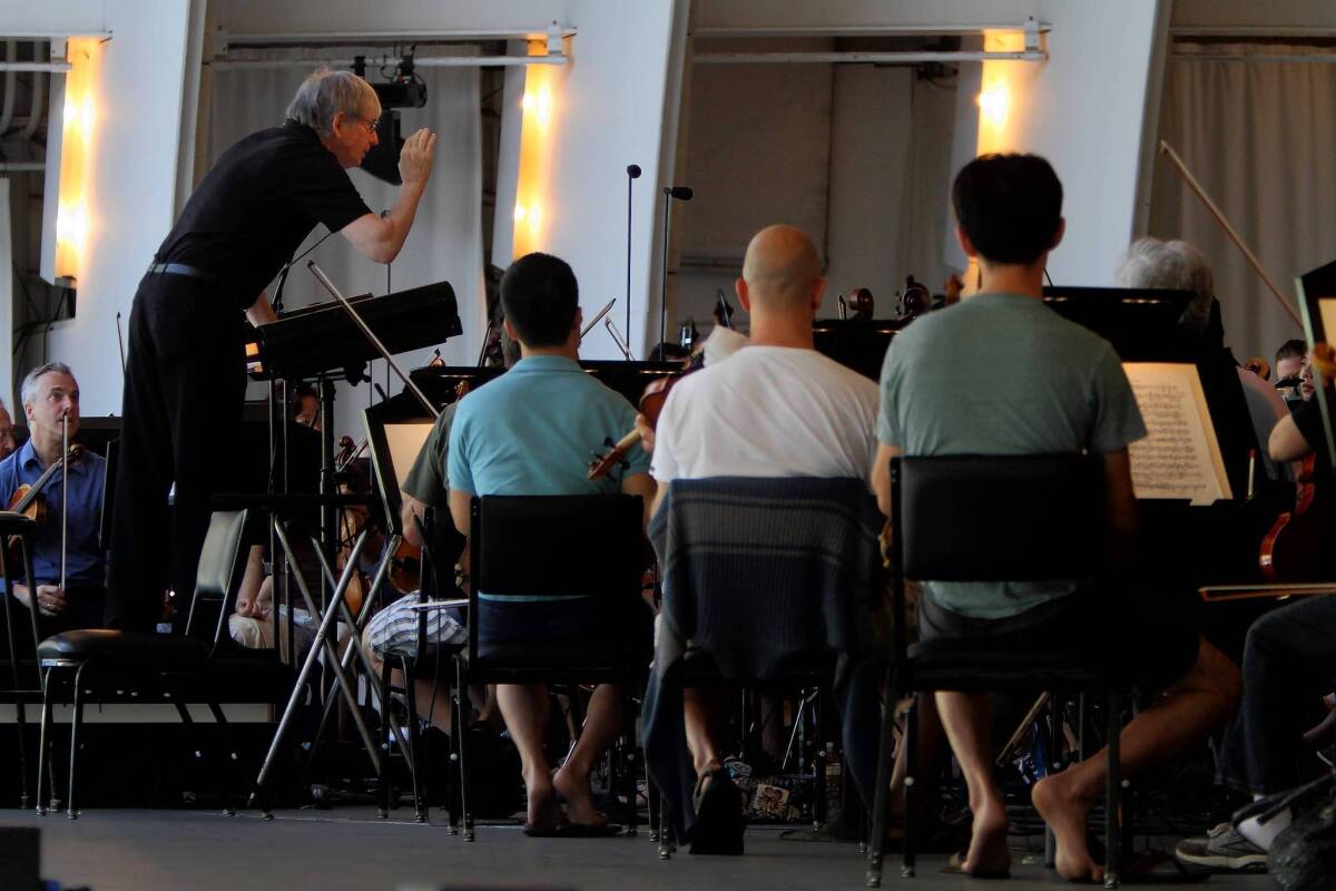 Going to the Hollywood Bowl is famous for its casual vibe. Going to the Bowl for a Tuesday or Thursday morning rehearsal is even more casual. And it's free. Here, Michael Tilson Thomas rehearses the L.A. Philharmonic on July 9.