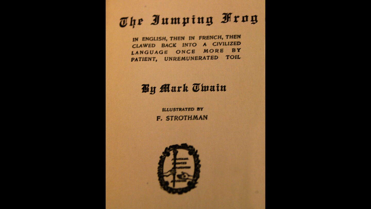 The title page from another edition of "The Jumping Frog" book, which states it is "In English, then in French, then clawed back into a civilized language once more by patient, unremunerated toil." The book is part of the Mark Twain Project and Papers collection at UC Berkeley's Bancroft Library.