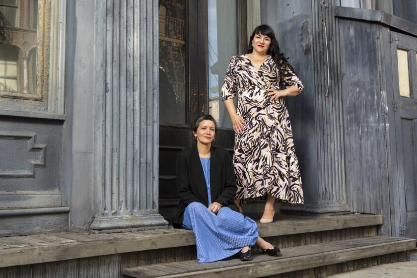 LOS ANGELES, California-JANUARY 31, 2020: From left: LACMA curator Rita Gonzalez and Vincent Price Art Museum director Pilar Tompkins Rivas pose for for a portrait at Paramount Studios. The two are serving as curators for the 2020 edition of Frieze Projects which will be on view from Feb. 14 to Feb. 16, 2020, as part of the Frieze Los Angeles art fair on the Paramount Studios backlot. (Gabriella Angotti-Jones/Los Angeles Times)