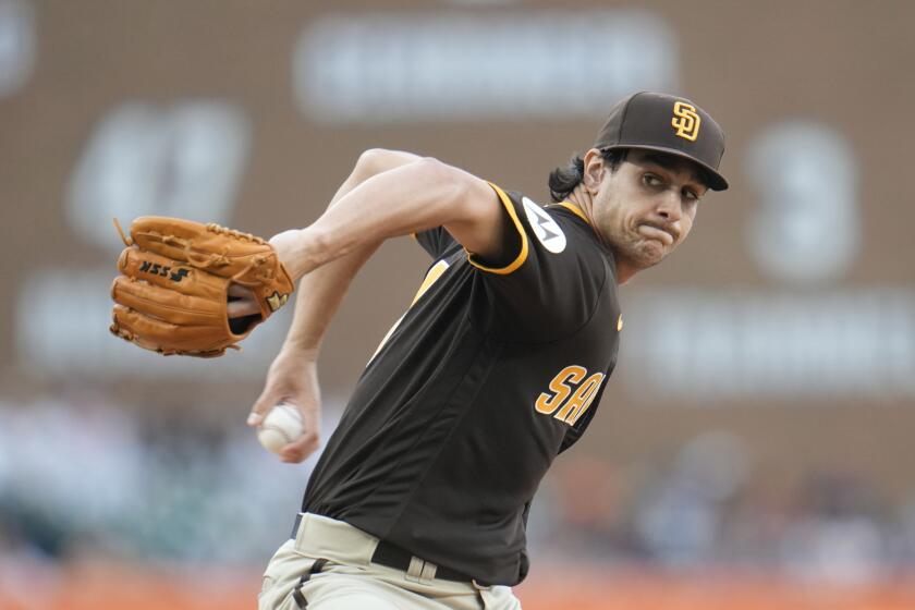 San Diego Padres pitcher Jackson Wolf throws against the Detroit Tigers in the first inning of a baseball game, Saturday, July 22, 2023, in Detroit. (AP Photo/Paul Sancya)