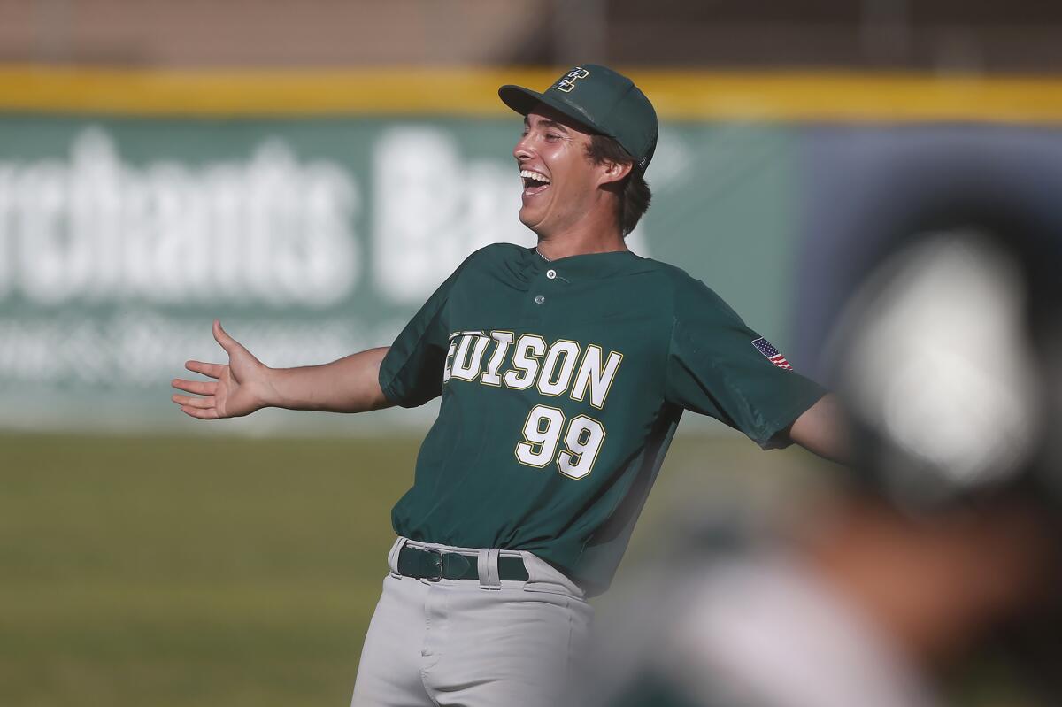 Edison starting pitcher Zack Marker looks to his bench in celebration after securing a shutout against Newport Harbor.