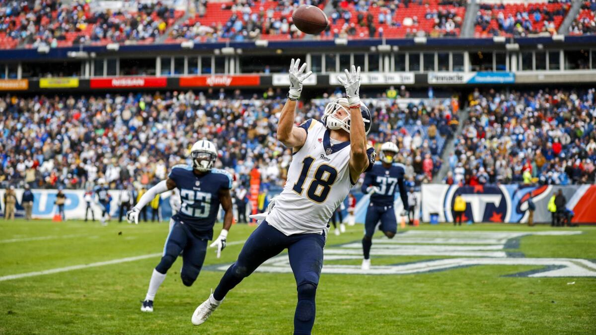 Wide receiver Cooper Kupp of the Los Angeles Rams makes a catch for a touchdown against the Tennessee Titans.