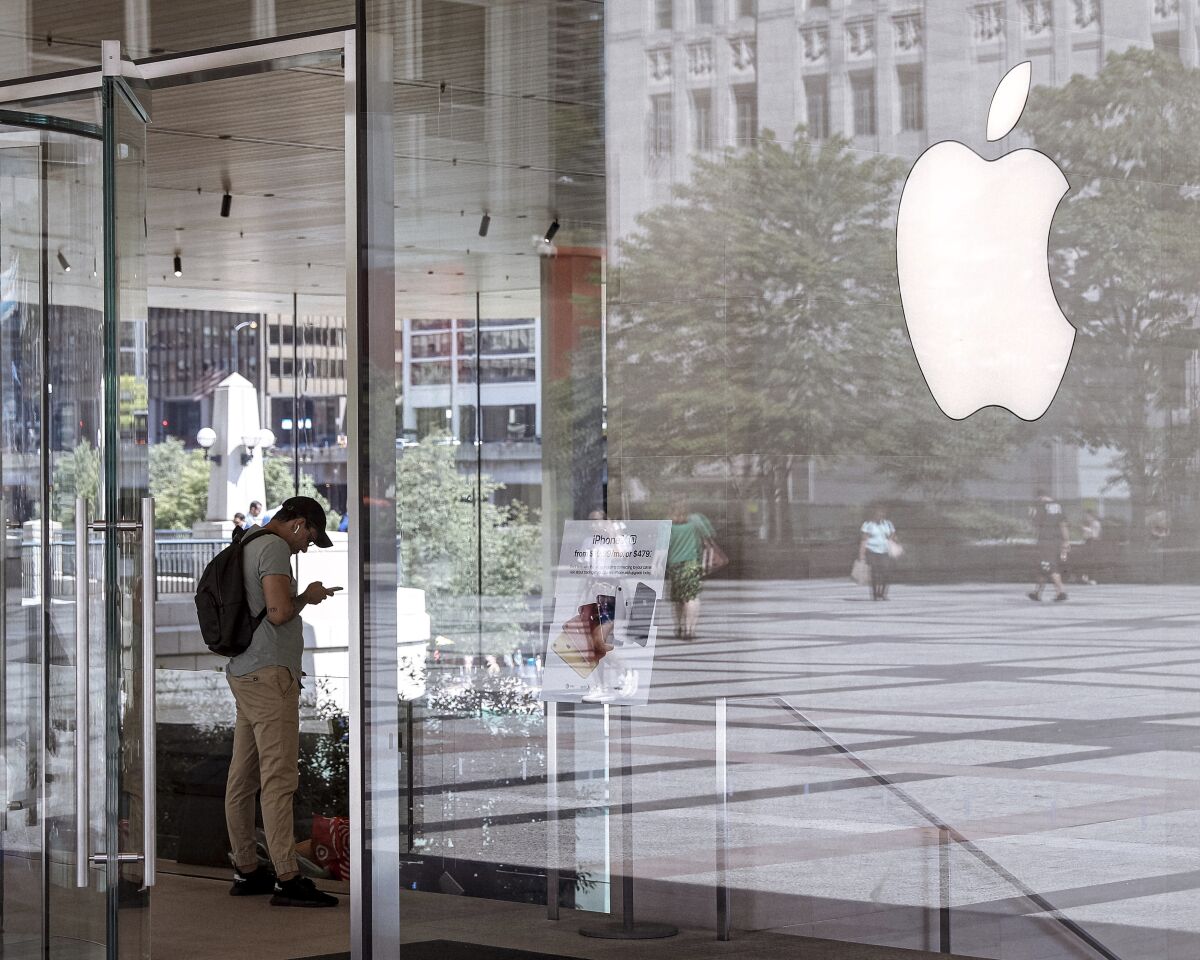 FILE - This Wednesday, July 24, 2019 photo shows an Apple Store in Chicago is seen. Apple reports financial earnings on Thursday, Feb. 2, 2023. (AP Photo/Amr Alfiky, File)