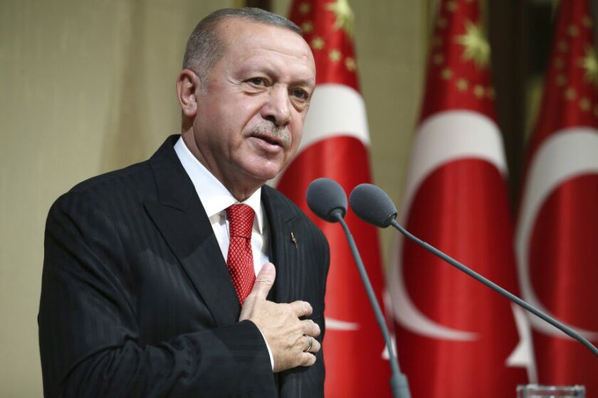 Turkish President Recep Tayyip Erdogan speaks during a reception on Republic Day in Ankara, Turkey, on Tuesday.