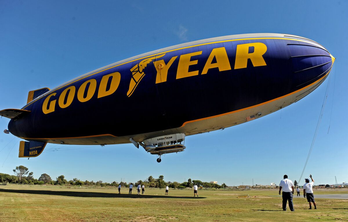 Crew members help the Spirit of America blimp take off at the Carson base. It has since been retired.