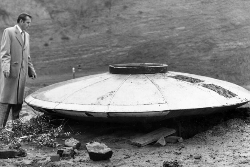 1957 file photo of a supposed flying saucer found in the Hollywood hills by importer Robert Balzer.