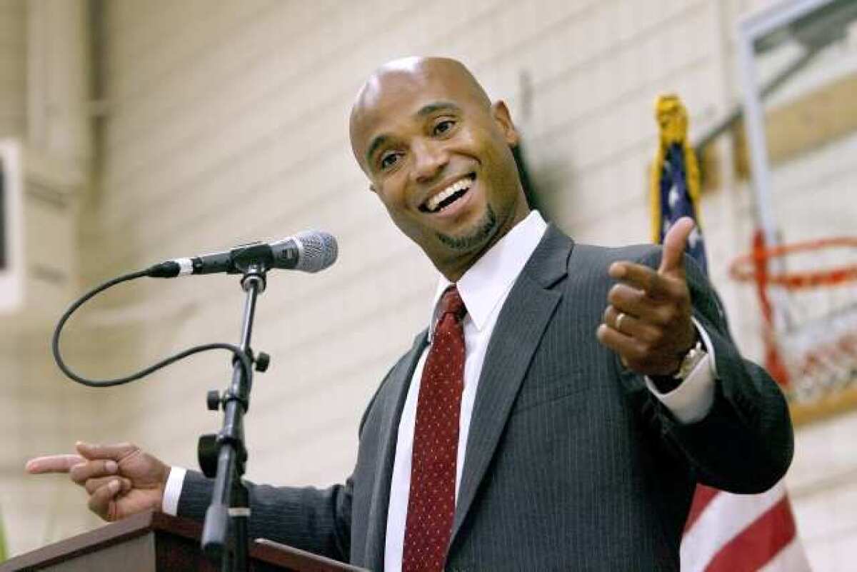 Former L.A. Dodgers player and current team chaplain Domingo Mota gives the keynote message at the Crescenta-Canada Family YMCA's 2012 Community Prayer Breakfast on Thursday. Mota'as father, Manuel Mota, also played for the Dodgers.