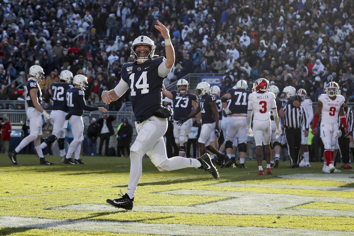 Penn State quarterback Sean Clifford celebrates after scoring a touchdown against Indiana.