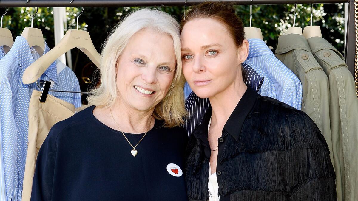 Stella McCartney is supported by her daughter Reiley