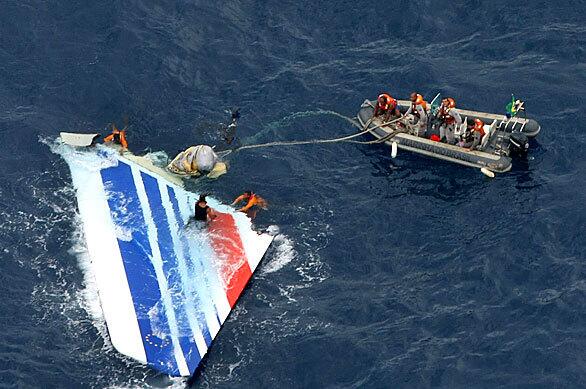 Brazilian divers recover a portion of the tail of Air France Flight 447, which crashed in the Atlantic on May 31 while en route from Rio de Janeiro to Paris with 228 people aboard.