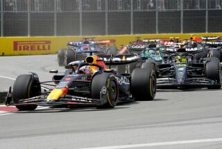 Mercedes driver Lewis Hamilton, of the United Kingdom, follows as Red Bull Racing's Max Verstappen.