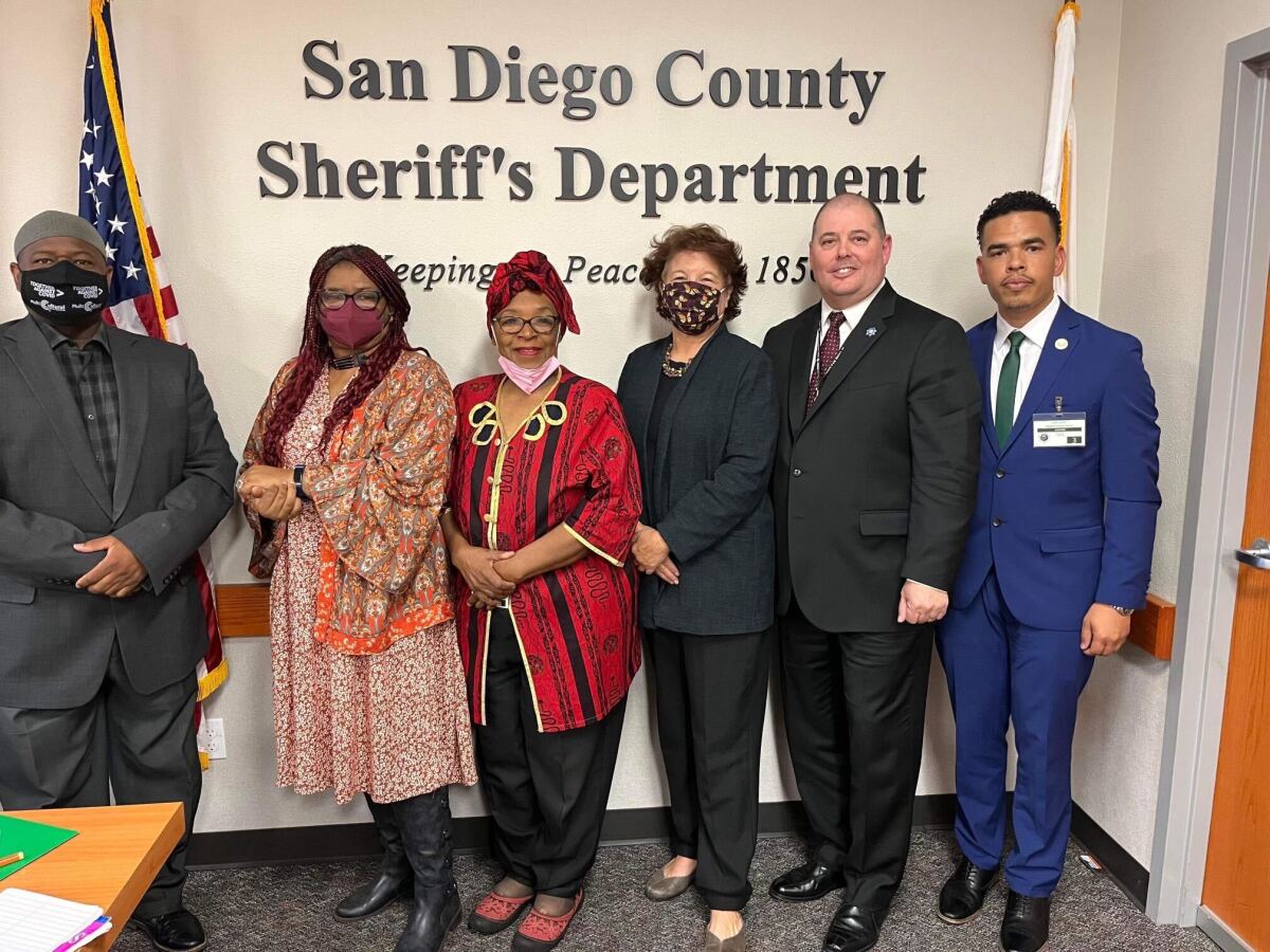 Community leaders and interim sheriff Anthony Ray at the department's headquarters Tuesday. 