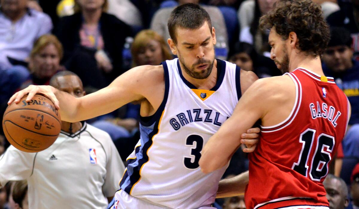Grizzlies center Marc Gasol works in the post against his brother, Bulls forward Pau Gasol (16), in the first half of a game earlier this season.