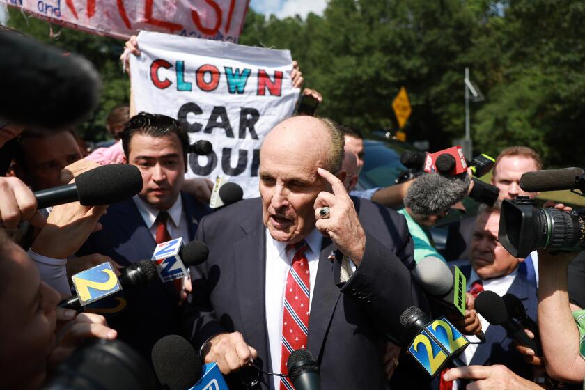 ATLANTA, GEORGIA - AUGUST 23: Rudy Giuliani speaks to the media after leaving the Fulton County jail on August 23, 2023 in Atlanta, Georgia. Giuliani is one of 19, including former President Donald Trump, facing felony charges in the indictment related to tampering with the 2020 election in Georgia who have been ordered to turn themselves in by August 25. (Photo by Joe Raedle/Getty Images)