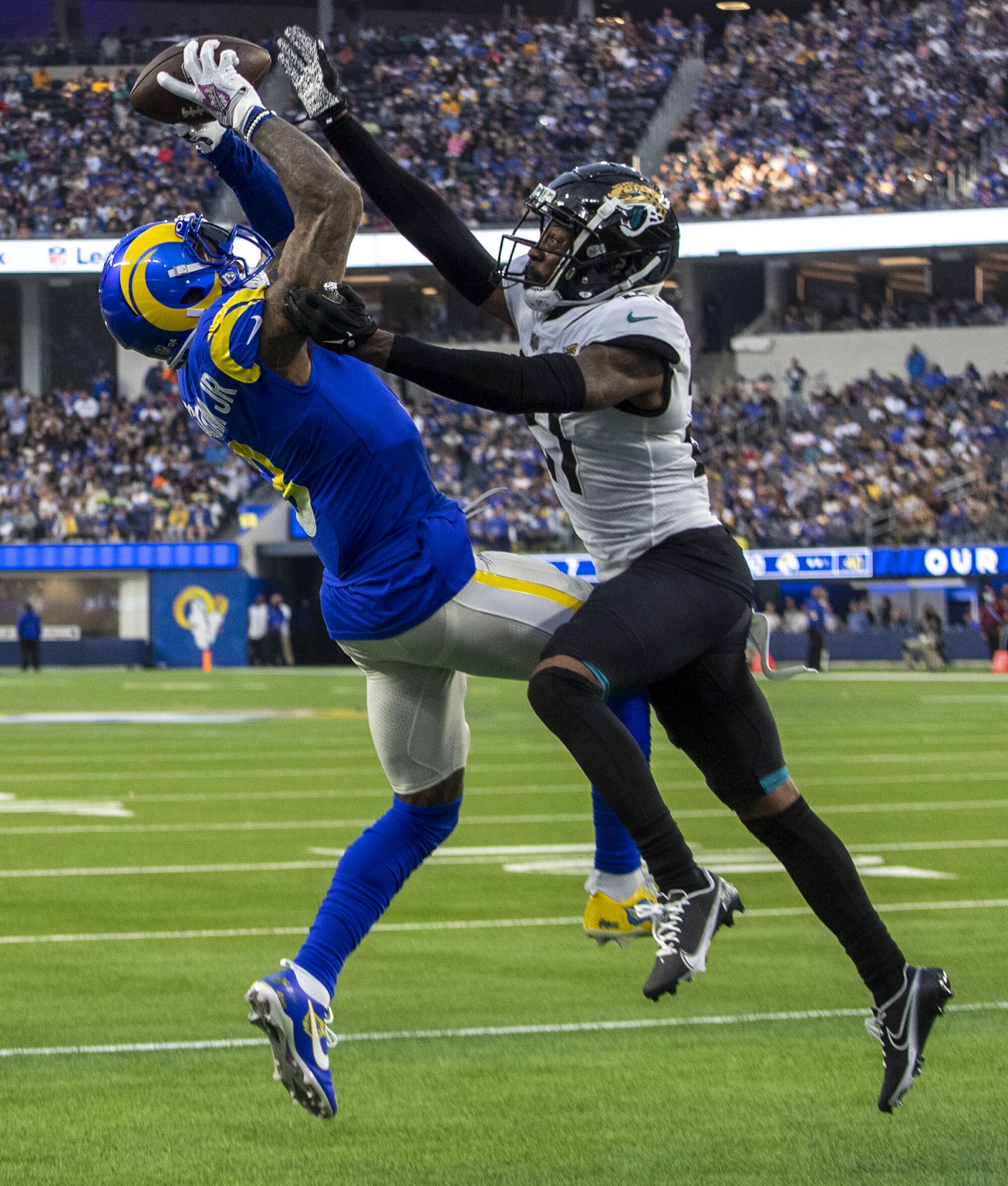 Rams receiver Odell Beckham Jr. hauls in a second half touchdown catch over Jaguars cornerback Nevin Lawson.