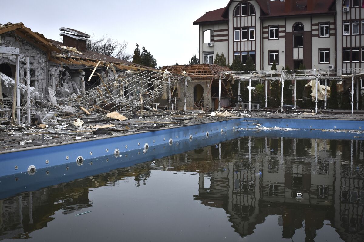 A damaged restaurant is seen after Russian shelling hit in Zaporizhzhia, Ukraine, Saturday, March 18, 2023. (AP Photo/Andriy Andriyenko)