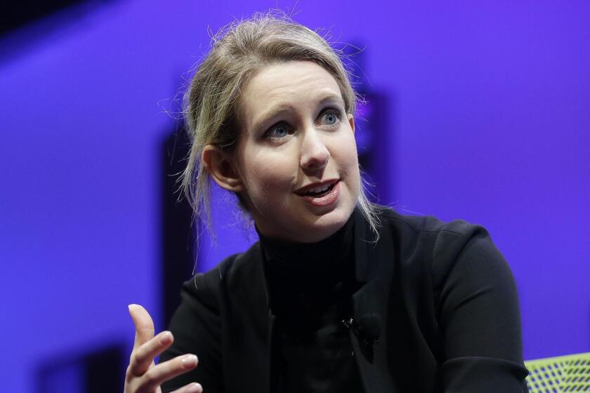 FILE- In this Nov. 2, 2015, file photo, Elizabeth Holmes, founder and CEO of Theranos, speaks at the Fortune Global Forum in San Francisco. The publisher of an investigative book on Theranos has moved up the release date from October to this spring. âBad Blood: Secrets and Lies in a Silicon Valley Startupâ was written by Pulitzer Prize winning journalist John Carreyrou, who in The Wall Street Journal first raised questions about the companyâs blood-testing technology. Alfred A. Knopf announced Thursday that publication is now scheduled for May 21. (AP Photo/Jeff Chiu, File)