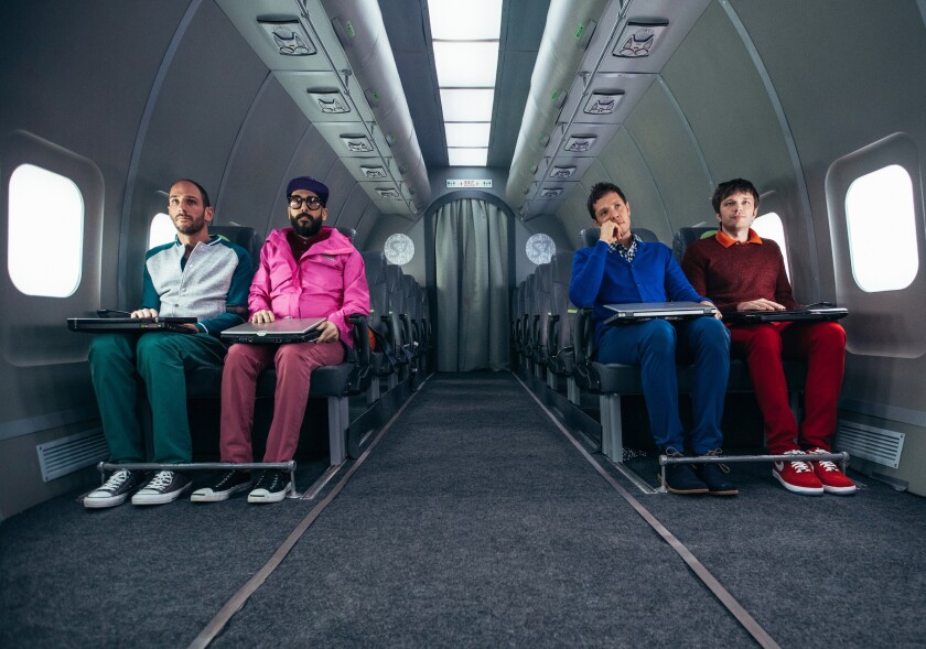 OK Go on set of the music video for "Upside Down and Inside Out" in 2014. The video was shot in a reduced gravity aircraft in a zero gravity environment.