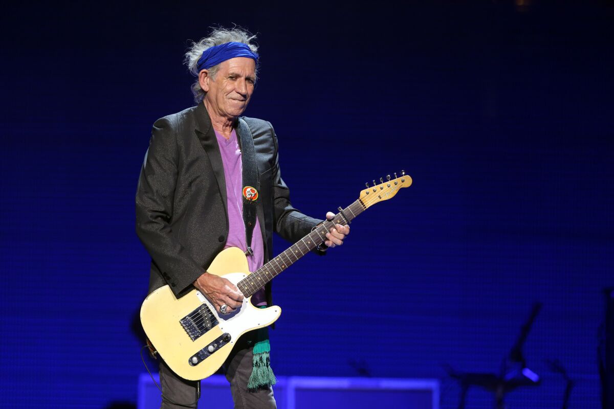 Rolling Stones guitarist Keith Richards is photographed performing at the United Center in June 2013.