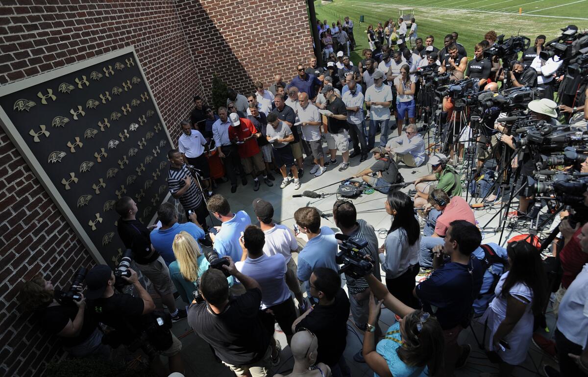 Ray Rice addresses the media outside Baltimore Ravens camp on Thursday.