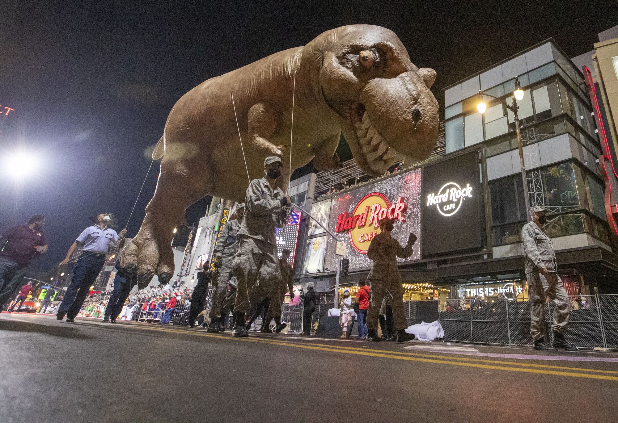 A T-Rex balloon floats down Hollywood Boulevard