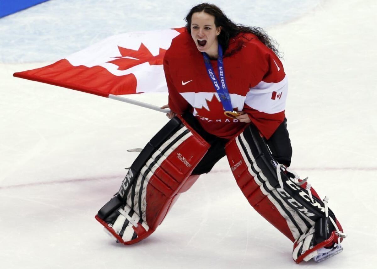 Canadian goalkeeper Shannon Szabados celebrates winning the Olympic gold medal on Feb. 21 in Sochi, Russia.