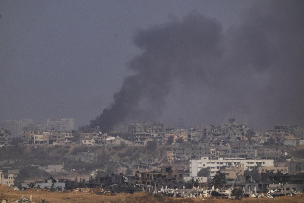 Smoke rises over the Gaza Strip.