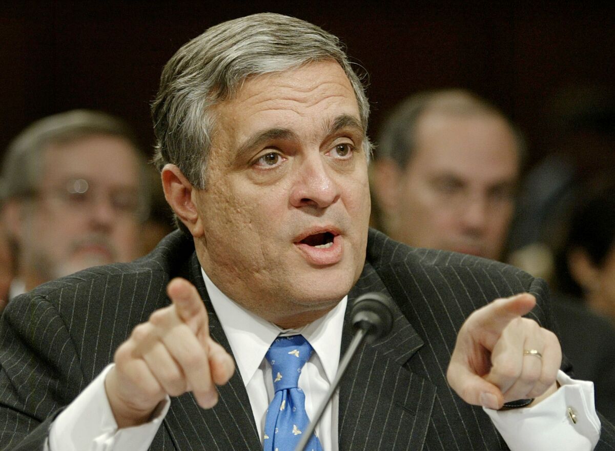CIA Director George Tenet testifies on Capitol Hill in March 2004.