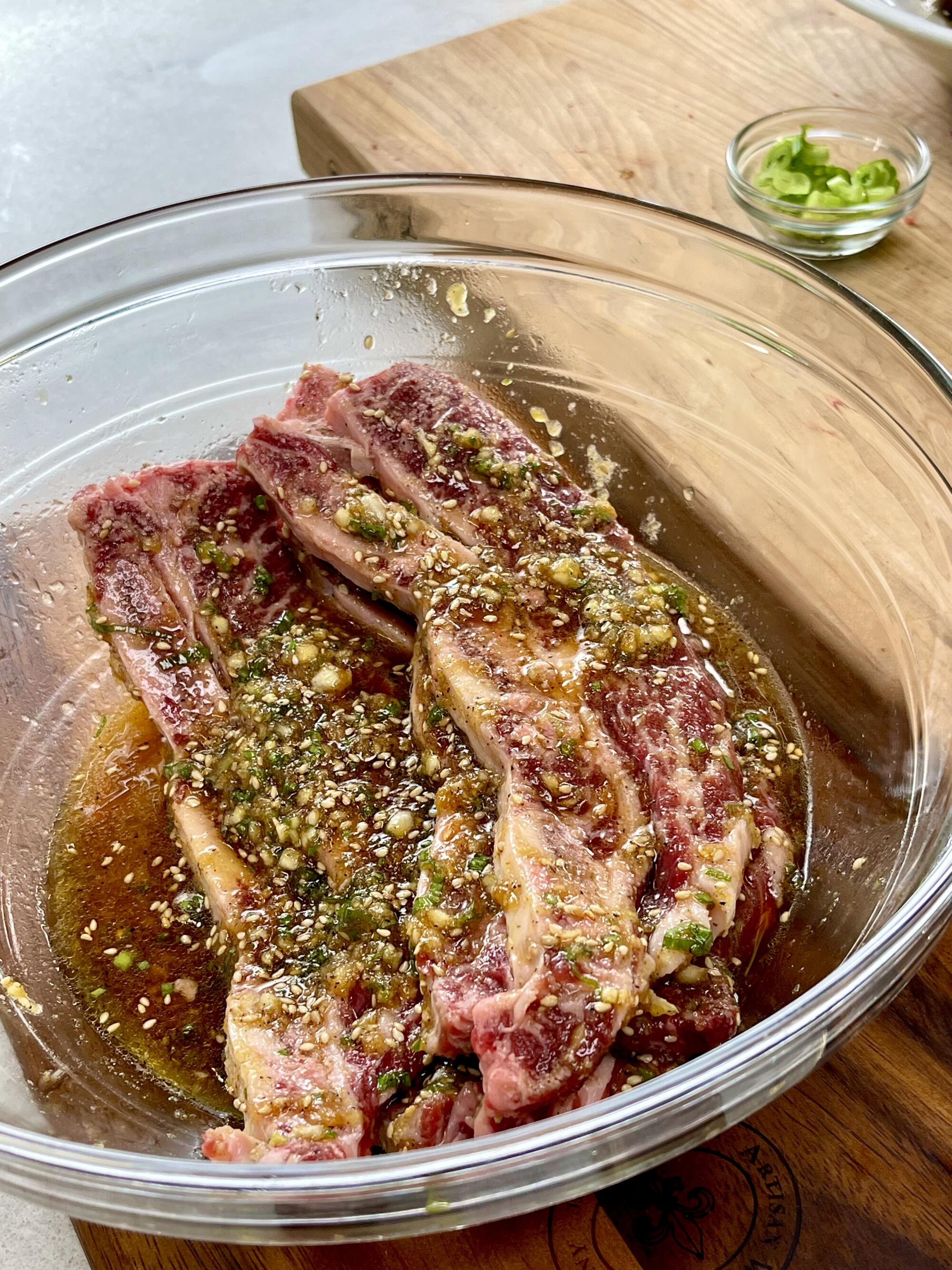 LA galbi, or lateral-cut short ribs, marinating in the "magic sauce" based on marinade used at Park's BBQ in Koreatown.