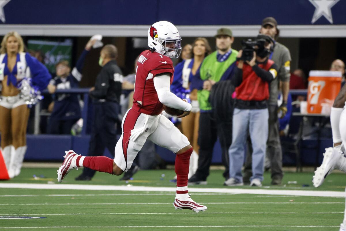 Arizona Cardinals quarterback Kyler Murray runs for a first down against the Dallas Cowboys.