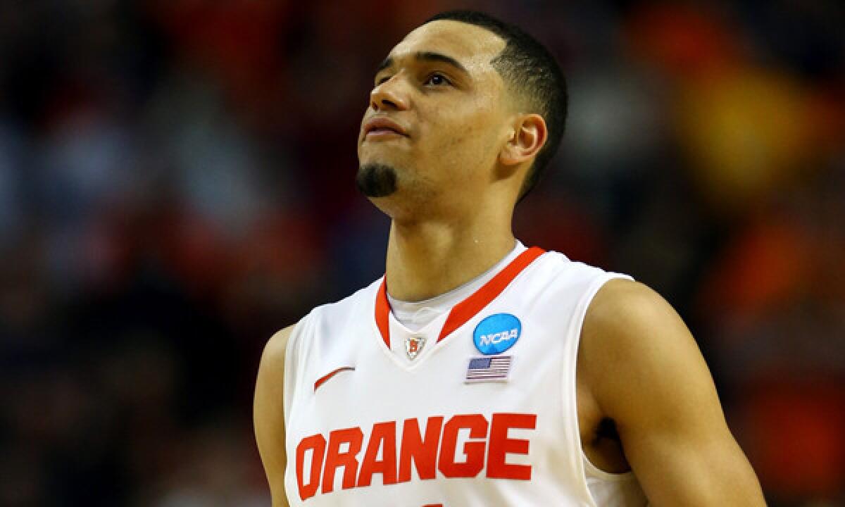 Syracuse's Tyler Ennis reacts after missing a shot in the closing seconds of his team's 55-53 loss to Dayton in the third round of the NCAA tournament. He is one of several top NBA prospects whose teams failed to advance to the Sweet 16.