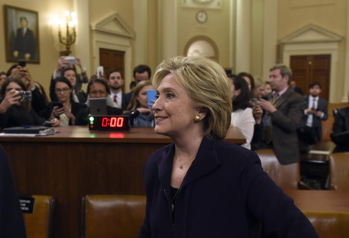 Former Secretary of State Hillary Rodham Clinton leaves after she testified before the House Select Committee on Benghazi on Capitol Hill on Oct. 22.
