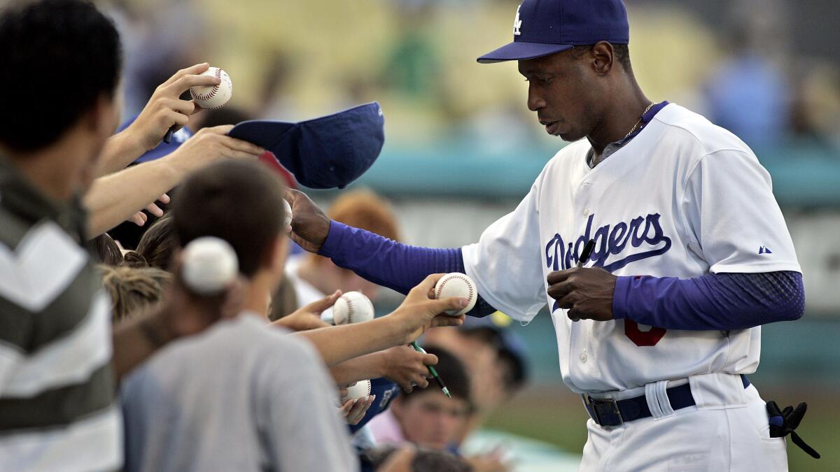 Cleveland Indians center fielder Kenny Lofton tosses his helmet after being  caught while trying to steal second in the first inning against the Kansas  City Royals on Friday, August 24, 2007, at