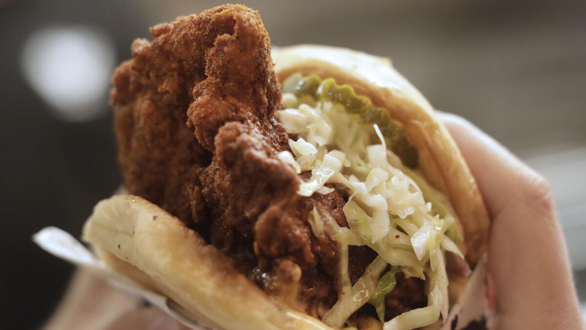 The Medium Plus spicy fried chicken sandwich at Howlin' Ray's.