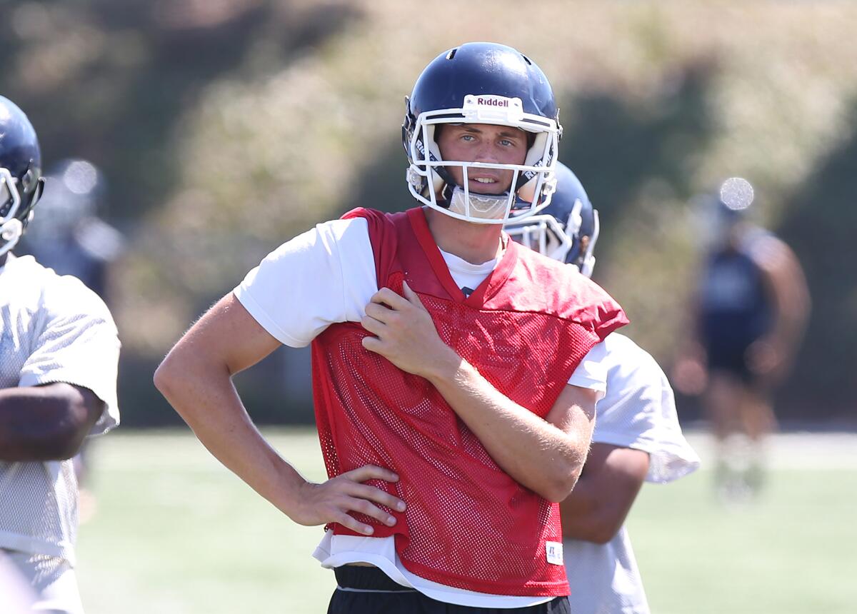 Adam Carr, pictured during a practice at Orange Coast College on Friday, is a 6-foot-4 pro-style quarterback.