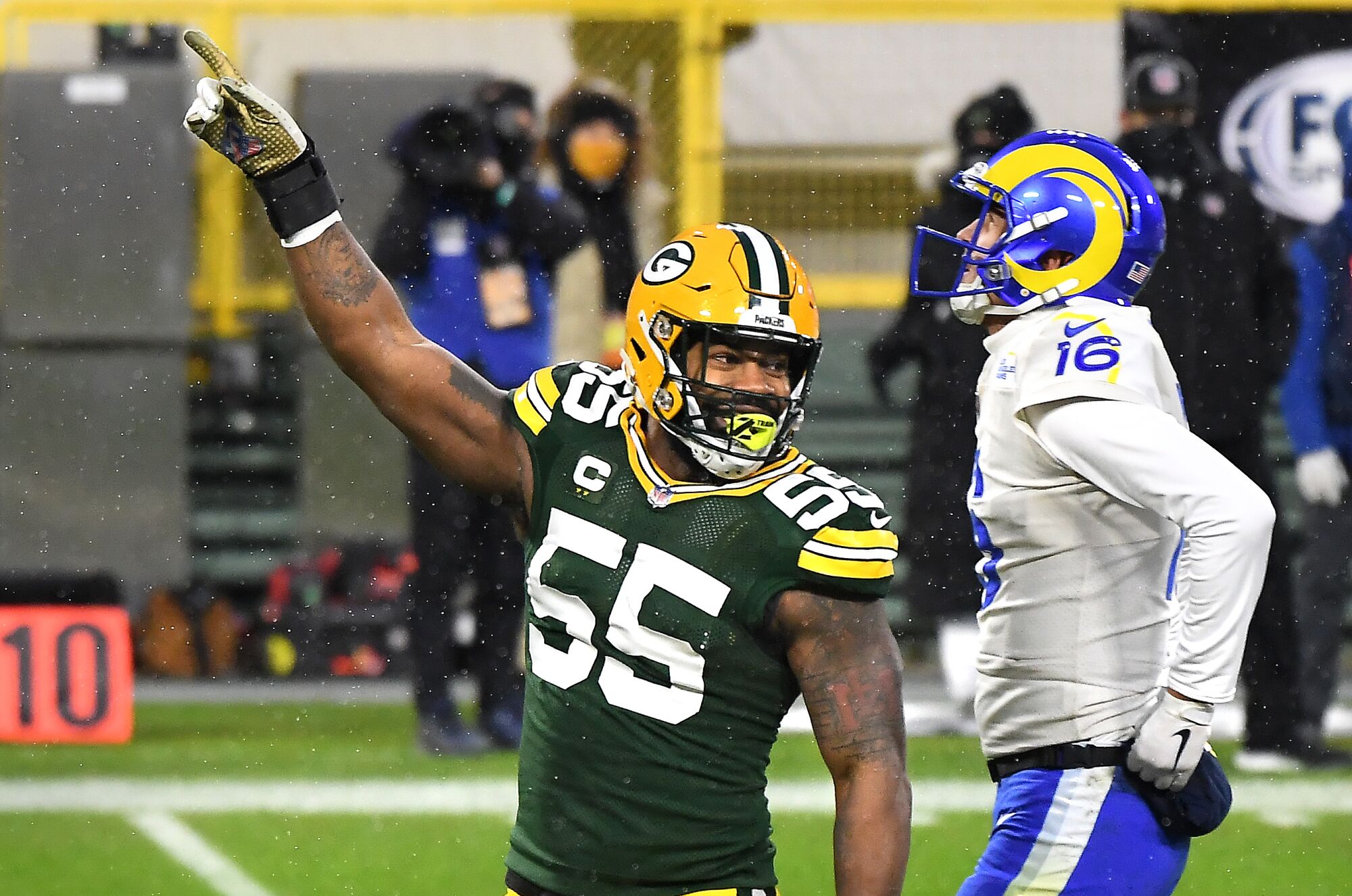 Green Bay Packers linebacker Za'Darius Smith celebrates after sacking Rams quarterback Jared Goff in the second quarter.