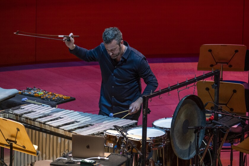 LOS ANGELES, CA - APRIL 19: Percussionist Joseph Pereira solo performance of William Kraft's "Encounters I," during an L.A. Phil Green Umbrella concert. at Walt Disney Concert Hall on Tuesday, April 19, 2022 in Los Angeles, CA. (Francine Orr / Los Angeles Times)