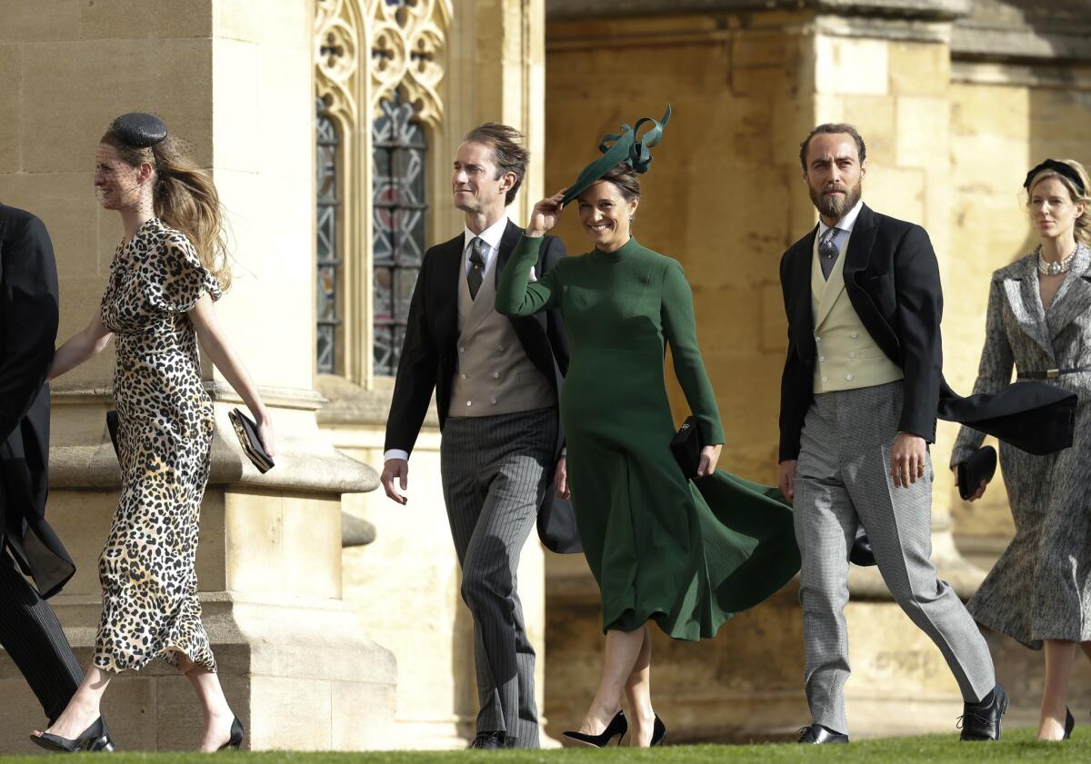 Pippa Middleton, pictured here in green dress, has given birth to a baby boy.