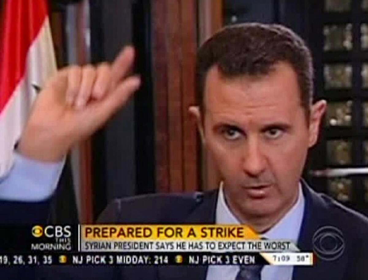 In this frame grab from video taken Sunday and provided by "CBS This Morning," Syrian President Bashar Assad responds to a question from journalist Charlie Rose during an interview in Damascus.